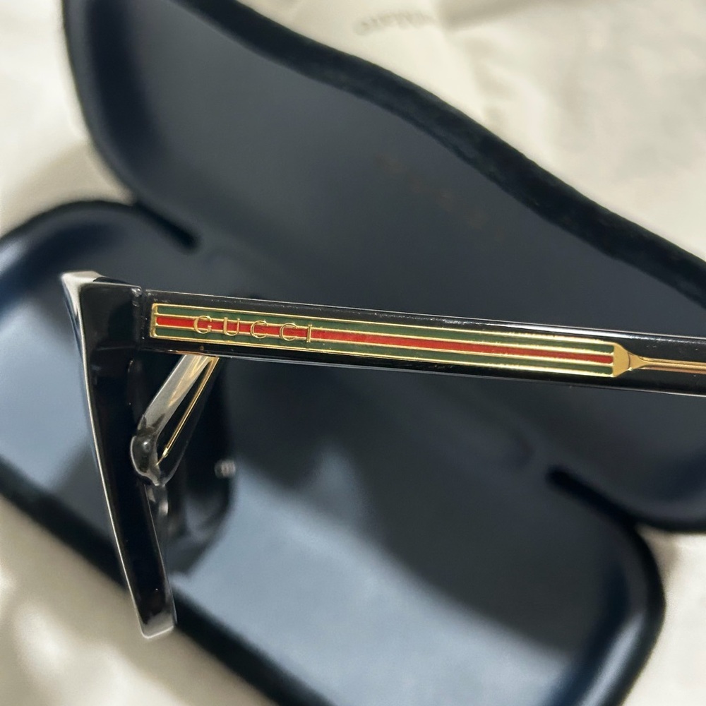 Gucci Black and Gold Sunglasses